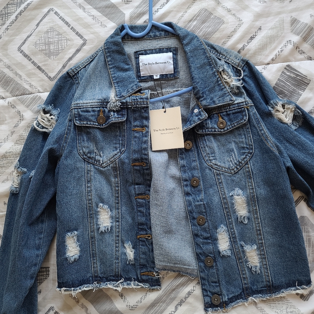 Distressed cropped jean jacket